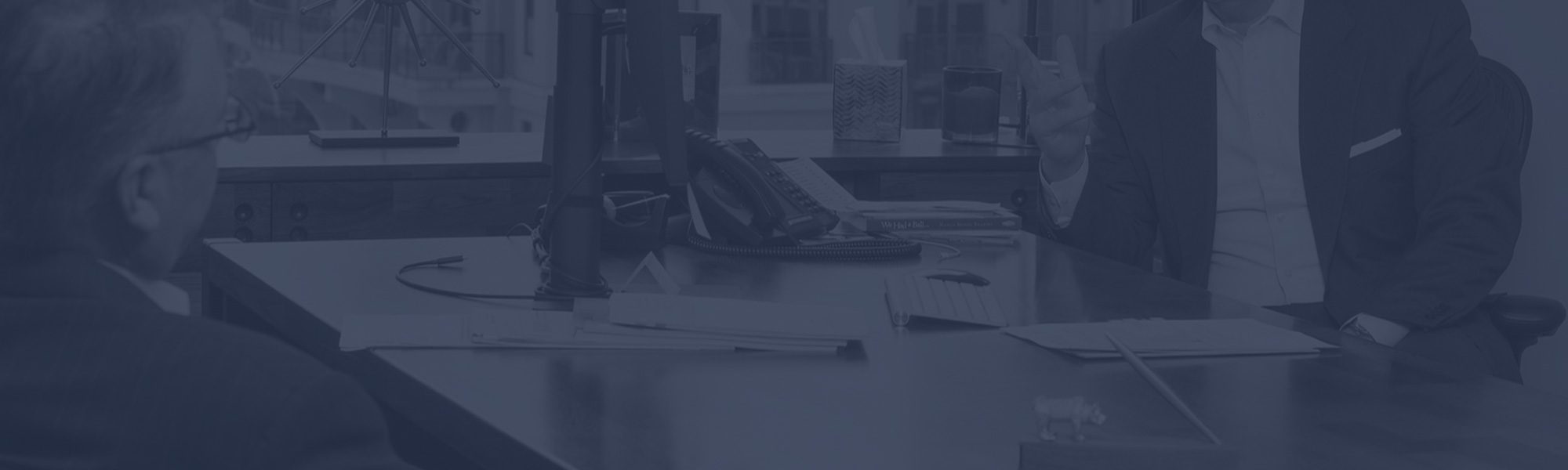 Two people talking in an office